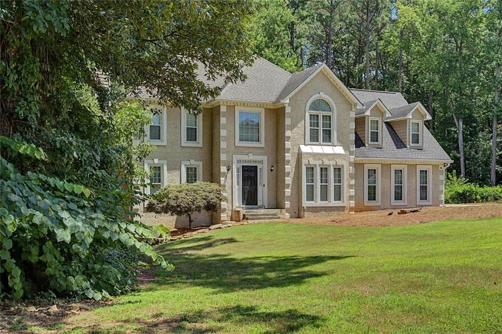 5 bedroom, 4 bathroom, 4,189 sq ft single family residence for sale at 6028 Wyndham Woods Drive, Powder Springs, GA 30127 — photo 2