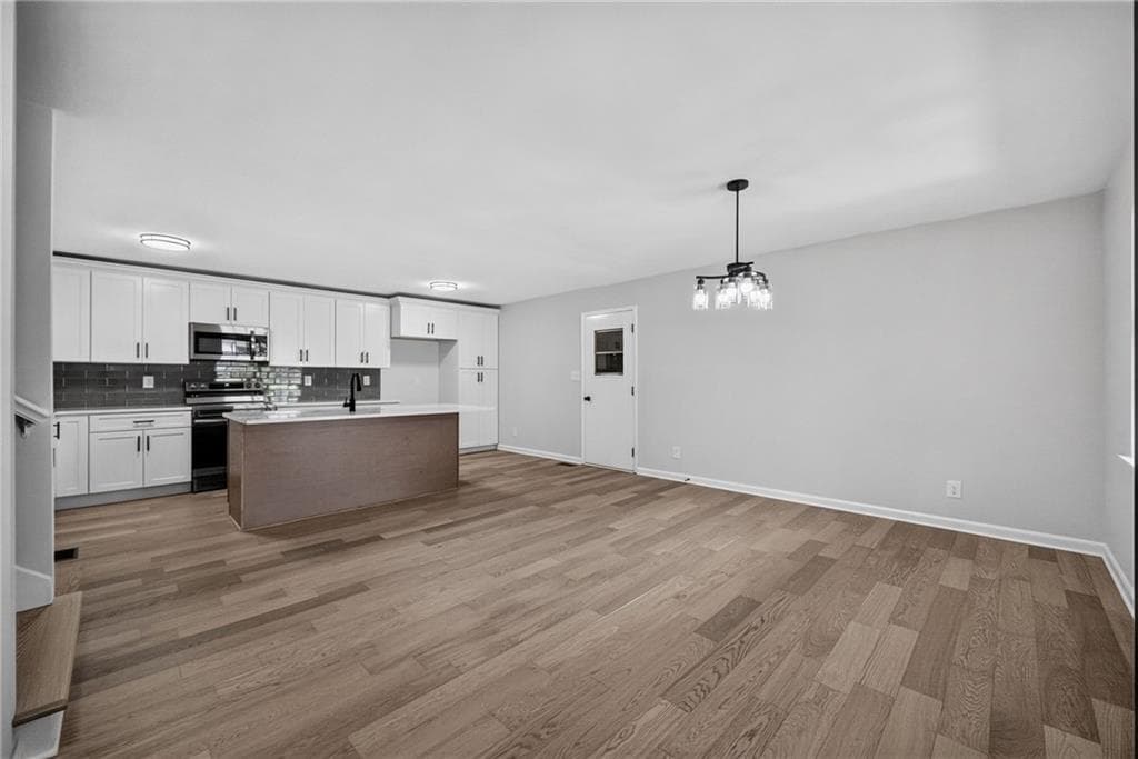 4 bedroom, 3 bathroom, 1,800 sq ft single family residence for sale at 2273 Ivy Crest Drive, Buford, GA 30519 — photo 5