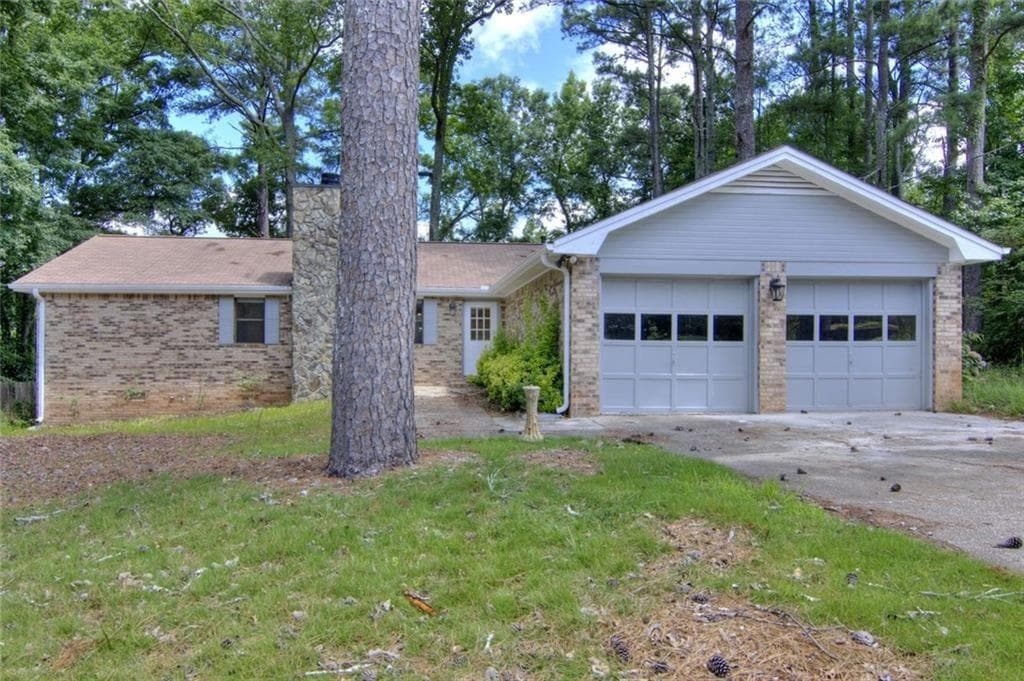 3 bedroom, 2 bathroom, 1,602 sq ft single family residence for sale at 2210 Village Drive, Covington, GA 30016 — photo 2