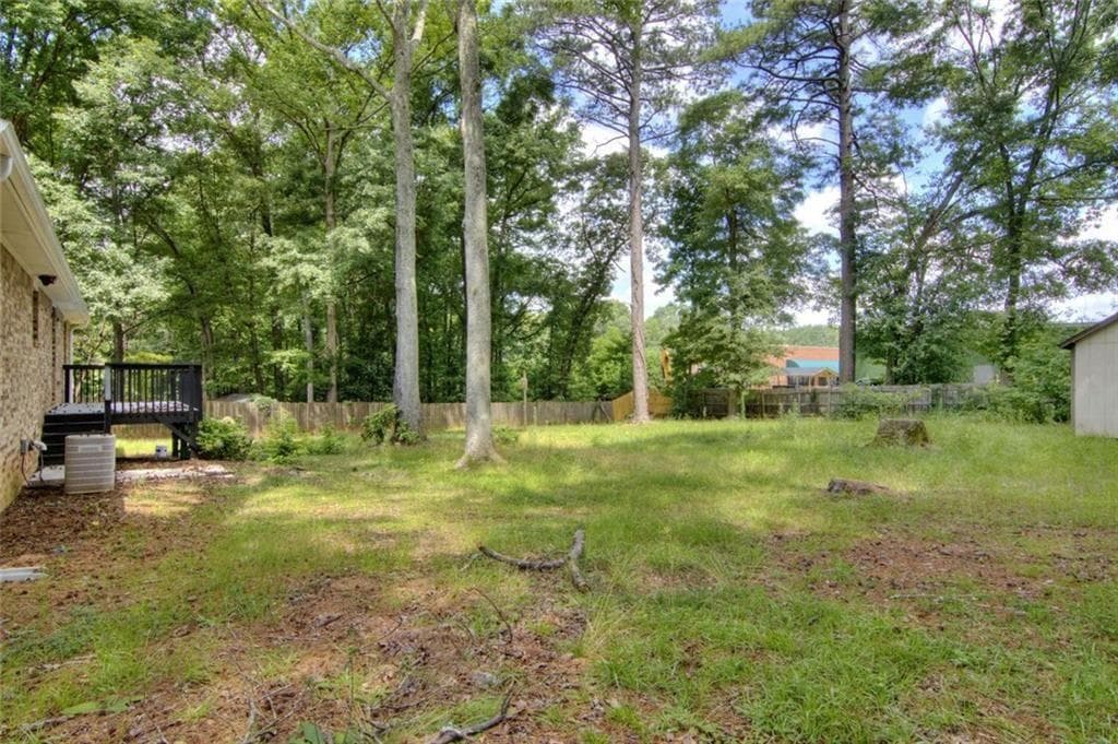 3 bedroom, 2 bathroom, 1,602 sq ft single family residence for sale at 2210 Village Drive, Covington, GA 30016 — photo 4