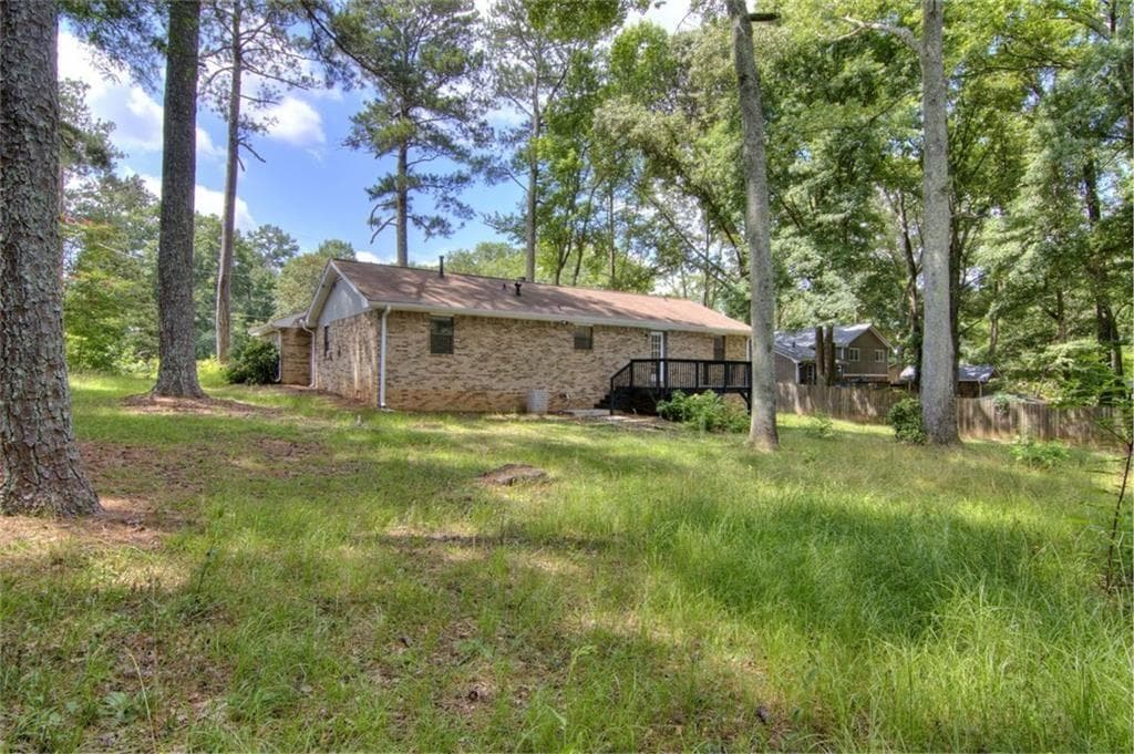3 bedroom, 2 bathroom, 1,602 sq ft single family residence for sale at 2210 Village Drive, Covington, GA 30016 — photo 5