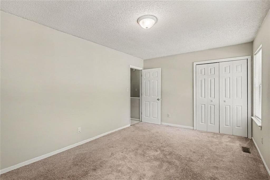 2 bedroom, 3 bathroom, 1,120 sq ft townhouse for sale at 8547 Jamestown Way, Jonesboro, GA 30238 — photo 10
