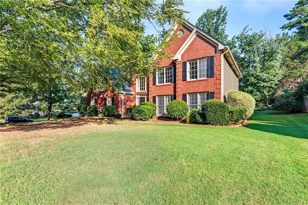 4 bedroom, 3 bathroom, 3,212 sq ft single family residence for sale at 2315 Shore View Way, Suwanee, GA 30024 — photo 2