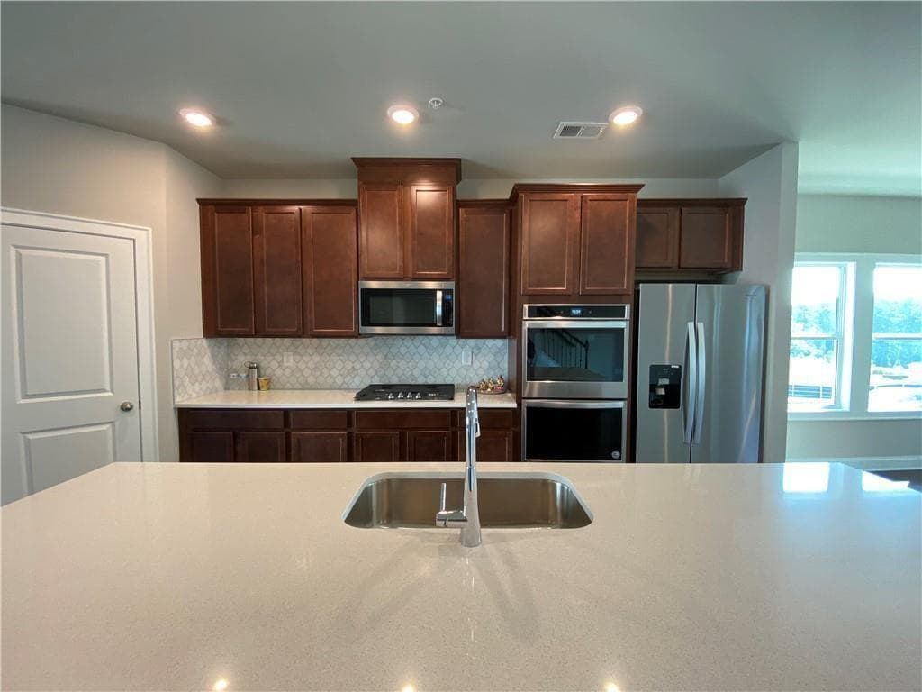 4 bedroom, 4 bathroom, 2,247 sq ft townhouse for rent at 912 Sweetwater Grove, Woodstock, GA 30188 for $2,695 a month — photo 8