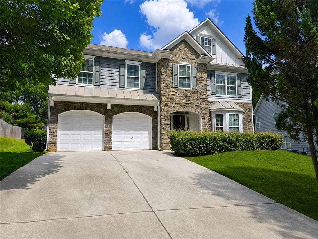 5 bedroom, 4 bathroom, 2,903 sq ft single family residence for sale at 3568 Park Hill Circle, Loganville, GA 30052 — photo 2