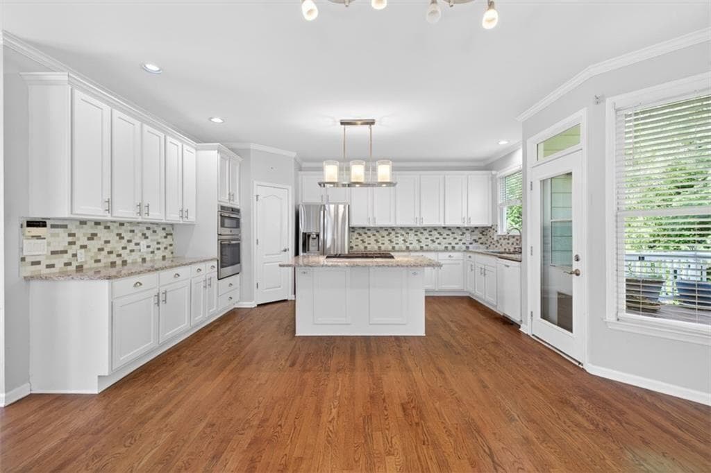 6 bedroom, 4 bathroom, 4,148 sq ft single family residence for sale at 1524 Lake Heights Circle, Dacula, GA 30019 — photo 5