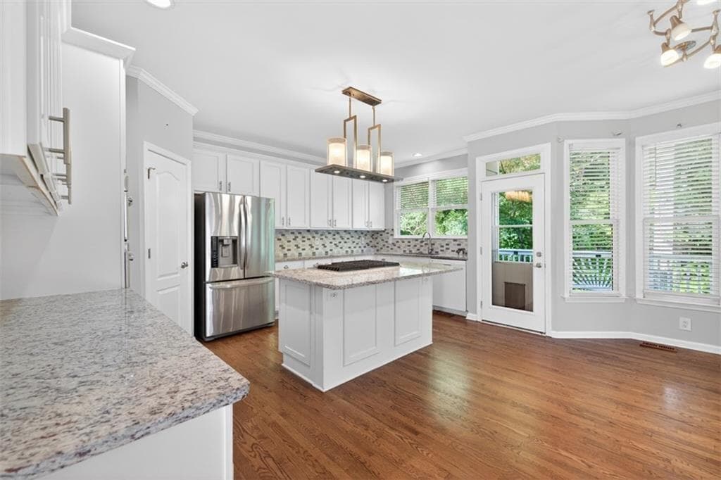 6 bedroom, 4 bathroom, 4,148 sq ft single family residence for sale at 1524 Lake Heights Circle, Dacula, GA 30019 — photo 6