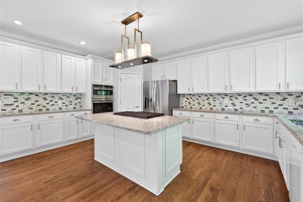6 bedroom, 4 bathroom, 4,148 sq ft single family residence for sale at 1524 Lake Heights Circle, Dacula, GA 30019 — photo 7
