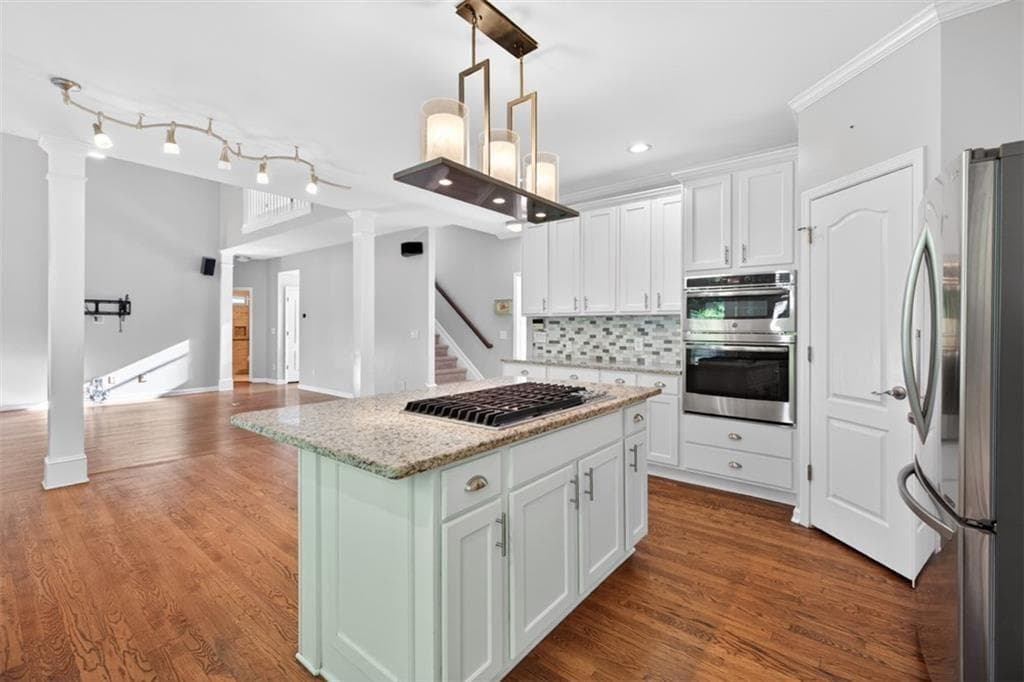 6 bedroom, 4 bathroom, 4,148 sq ft single family residence for sale at 1524 Lake Heights Circle, Dacula, GA 30019 — photo 8