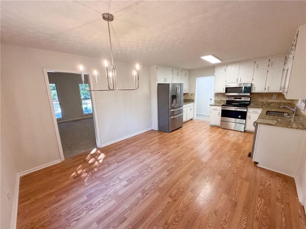 4 bedroom, 3 bathroom, 2,147 sq ft single family residence for sale at 1825 Marsh Creek Drive, Lawrenceville, GA 30043 — photo 6