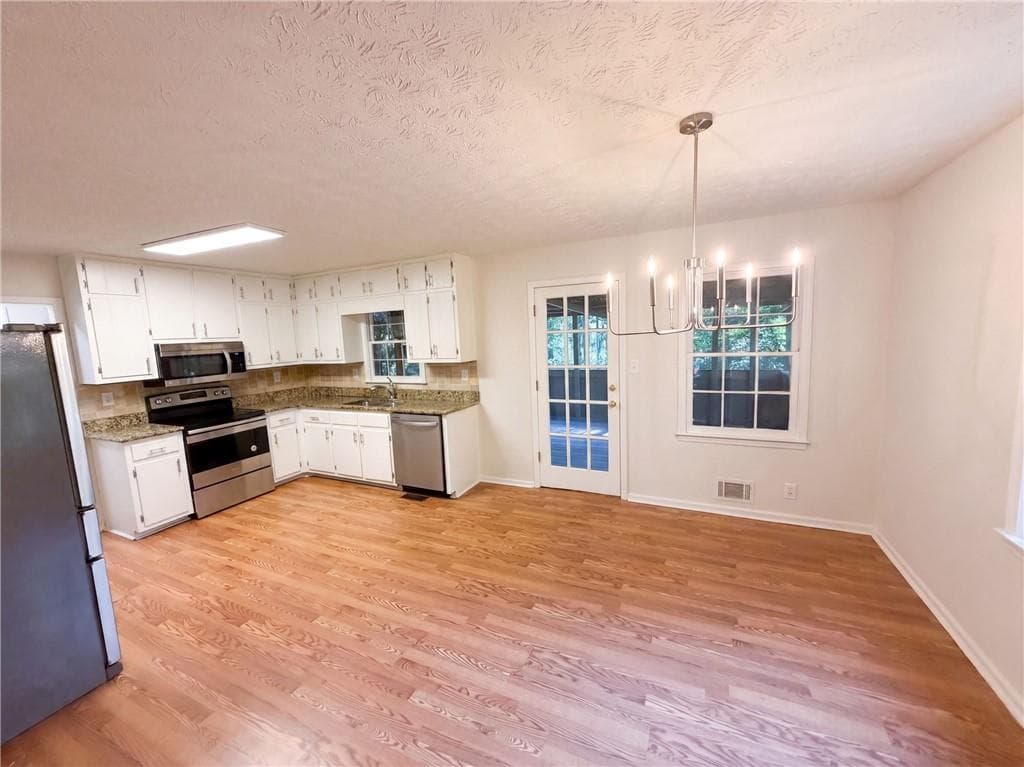 4 bedroom, 3 bathroom, 2,147 sq ft single family residence for sale at 1825 Marsh Creek Drive, Lawrenceville, GA 30043 — photo 9