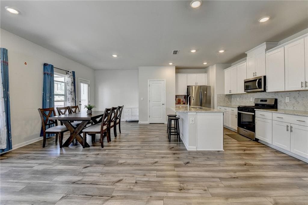 4 bedroom, 3 bathroom, 1,963 sq ft single family residence for sale at 2531 Canning View Avenue, Lawrenceville, GA 30044 — photo 6