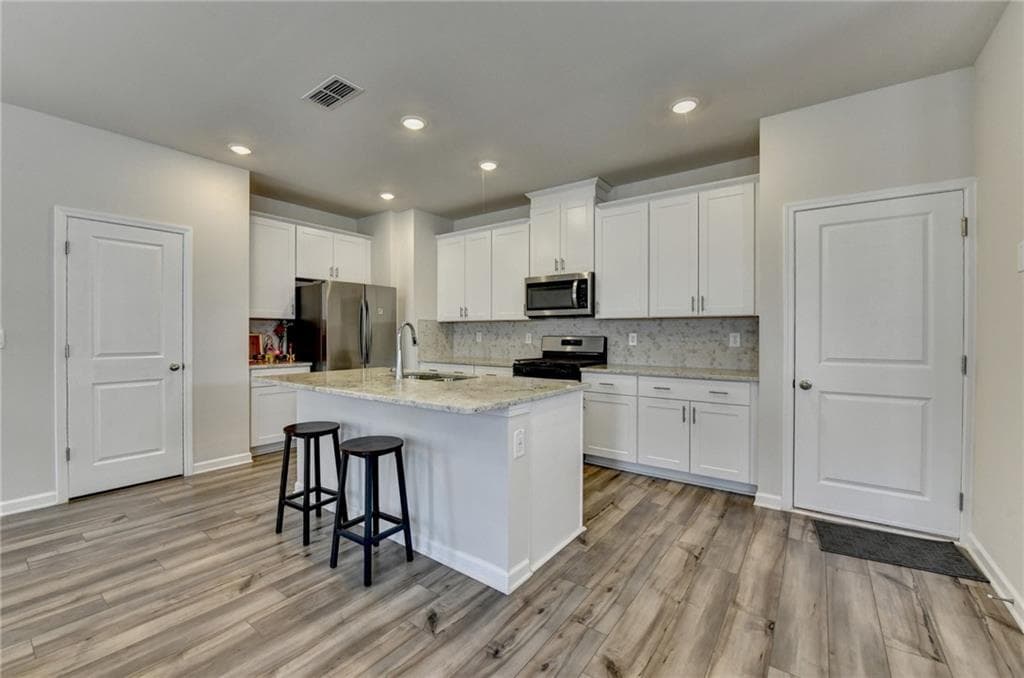 4 bedroom, 3 bathroom, 1,963 sq ft single family residence for sale at 2531 Canning View Avenue, Lawrenceville, GA 30044 — photo 8