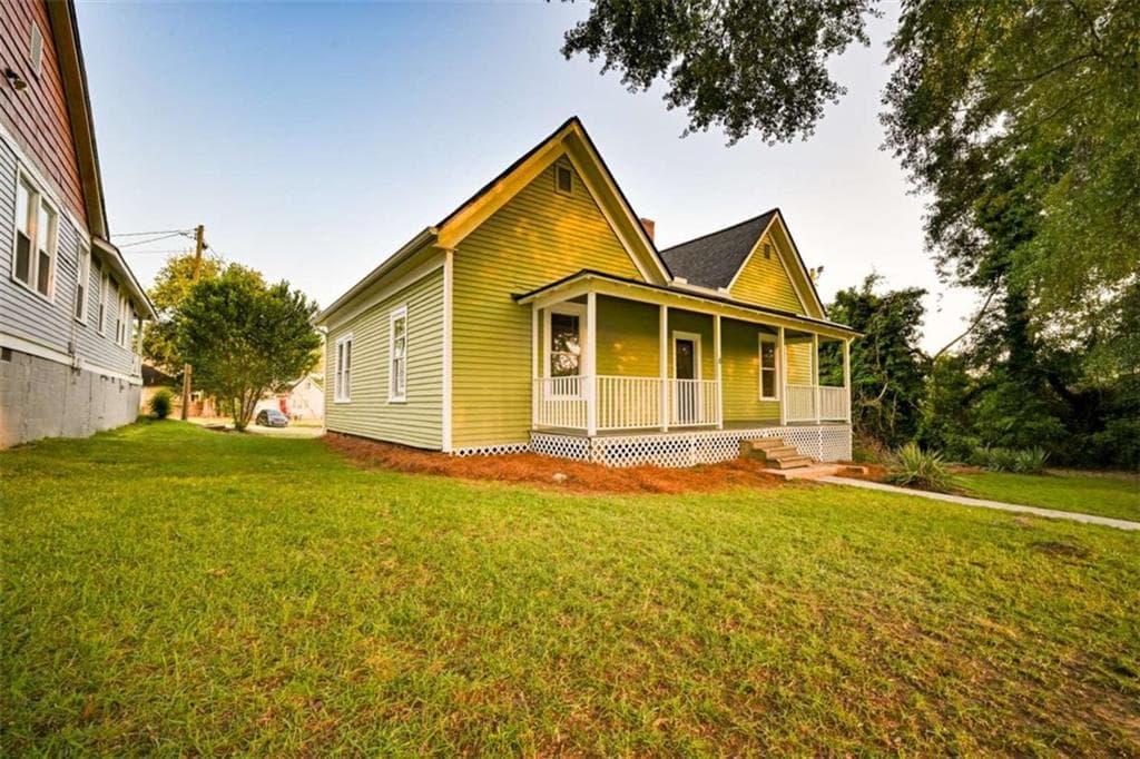 2 bedroom, 1 bathroom, 1,460 sq ft single family residence for sale at 6 N Broad Street, Covington, GA 30014 — photo 2
