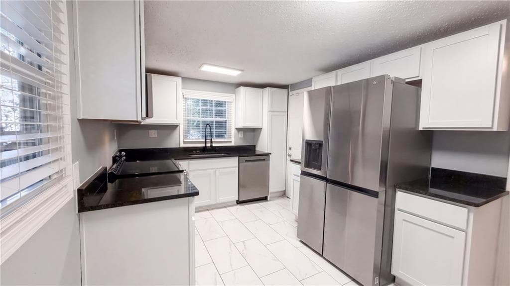 3 bedroom, 2 bathroom, 2,428 sq ft single family residence for sale at 1411 Fulton Avenue, Atlanta, GA 30344 — photo 2
