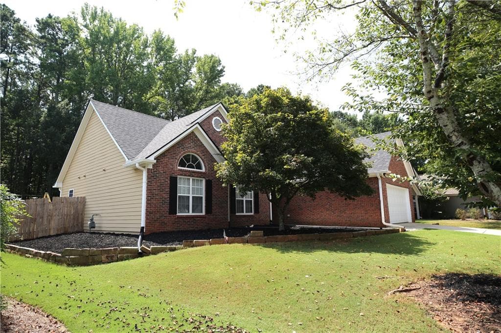 4 bedroom, 2 bathroom, 2,084 sq ft single family residence for sale at 3458 English Oaks Drive, Kennesaw, GA 30144 — photo 2