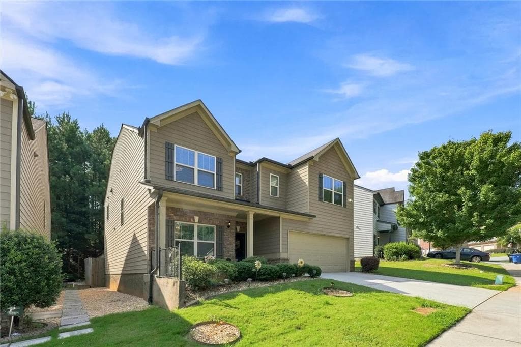 5 bedroom, 3 bathroom, 3,208 sq ft single family residence for sale at 3924 Kingfisher Drive, Atlanta, GA 30349 — photo 2