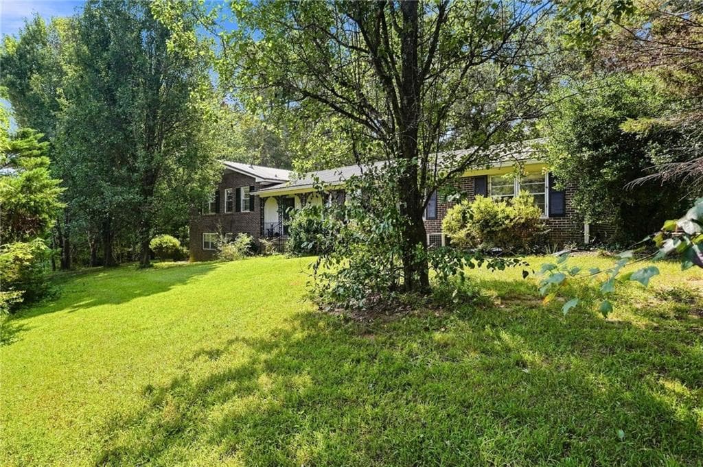 4 bedroom, 3 bathroom, 2,552 sq ft single family residence for sale at 7018 Highway 27, Buchanan, GA 30113