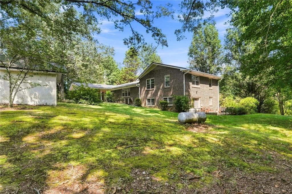 4 bedroom, 3 bathroom, 2,552 sq ft single family residence for sale at 7018 Highway 27, Buchanan, GA 30113 — photo 3