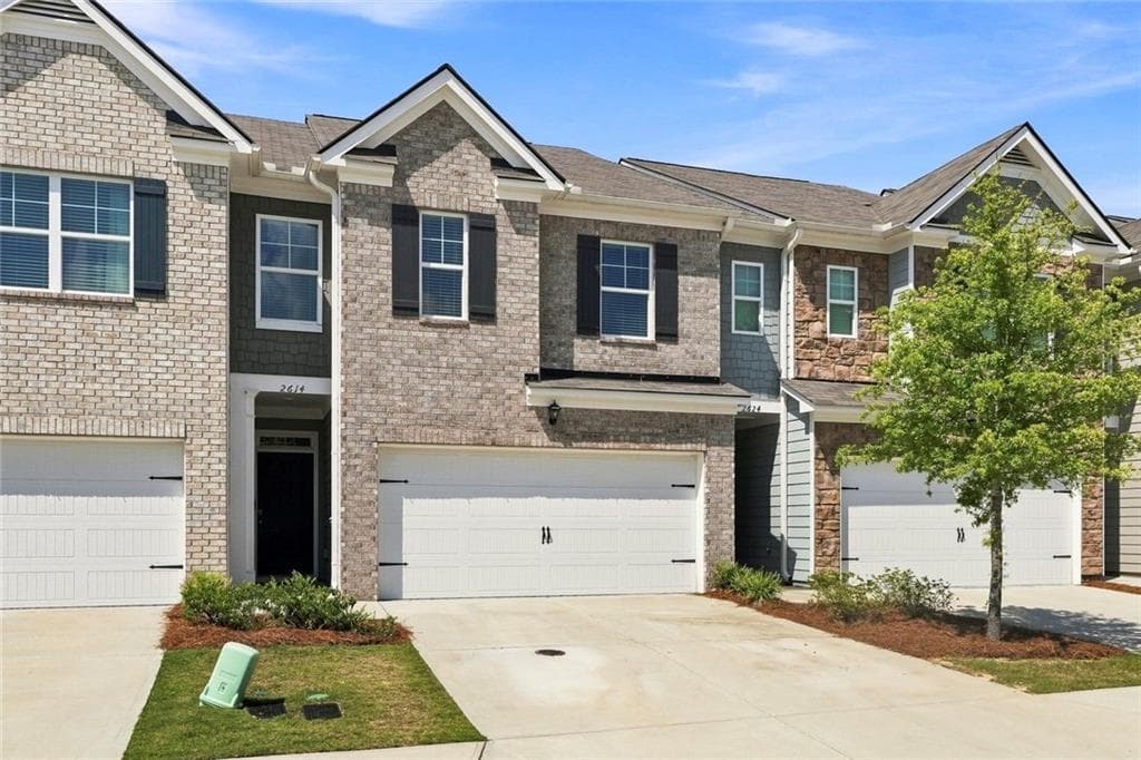 3 bedroom, 3 bathroom, 1,980 sq ft townhouse for rent at 2614 Poppy Court, Buford, GA 30519 for $2,250 a month — photo 2