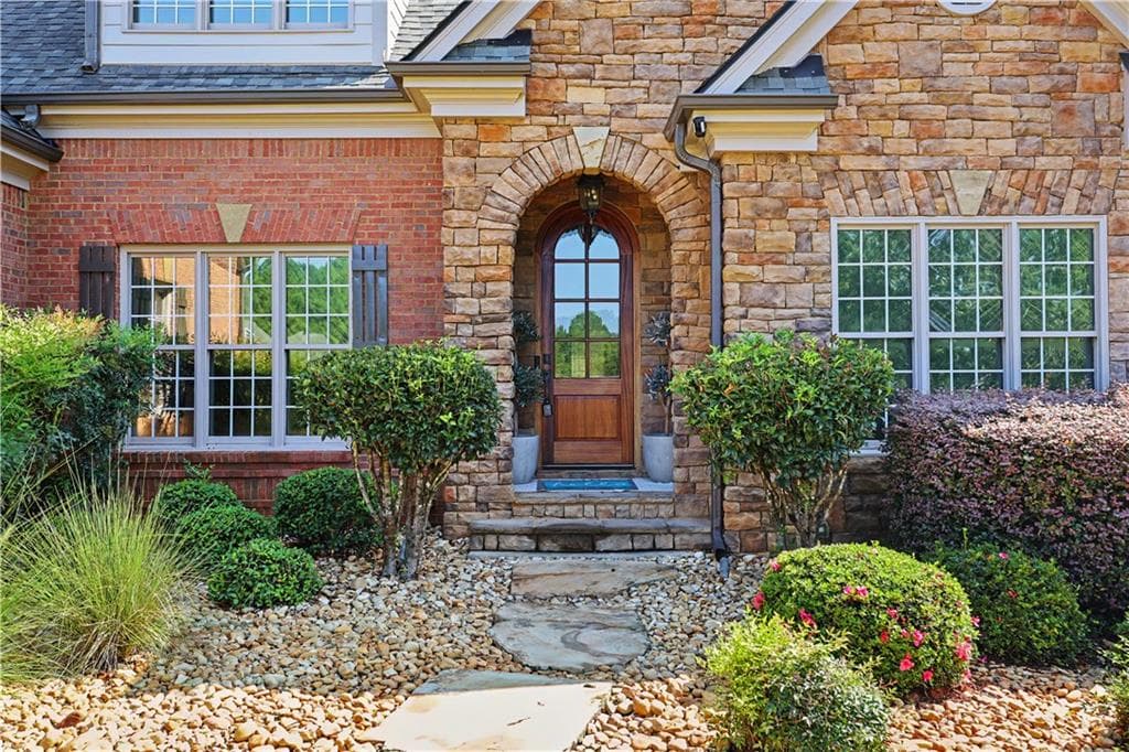 9 bedroom, 7 bathroom, 7,506 sq ft single family residence for sale at 116 River Bend Dr, Hoschton, GA 30548 — photo 10