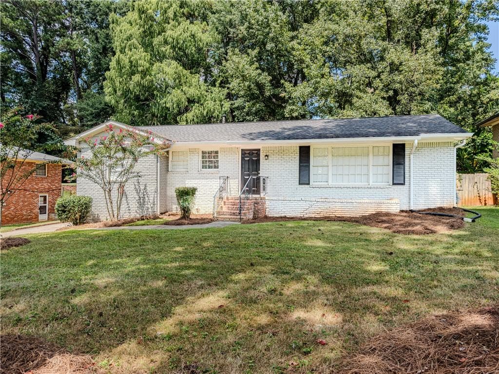 4 bedroom, 2 bathroom, 2,160 sq ft single family residence for sale at 3532 Dial Dr, Stone Mountain, GA 30083 — photo 2