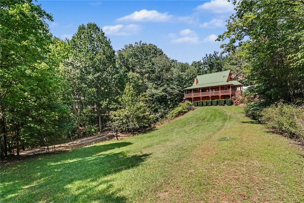 4 bedroom, 3 bathroom, 2,712 sq ft single family residence for sale at 825 Satterfield Road, Cleveland, GA 30528 — photo 2