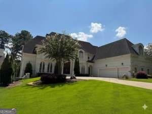 7 bedroom, 7 bathroom, 11,002 sq ft single family residence under contract at 2212 Ascott Valley Trc, Johns Creek, GA 30097 — photo 2