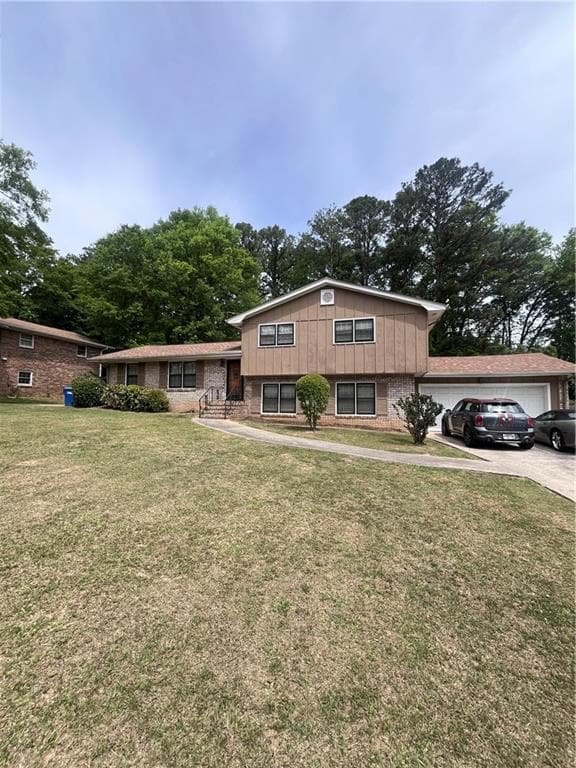 4 bedroom, 3 bathroom, 1,646 sq ft single family residence for sale at 4240 Melanie Lane, Atlanta, GA 30349 — photo 2
