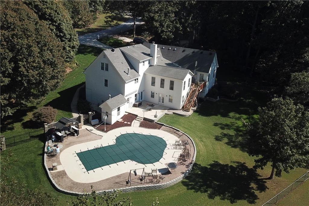 5 bedroom, 5 bathroom, 5,155 sq ft single family residence for sale at 2100 Oak Village Lane, Lawrenceville, GA 30043 — photo 2