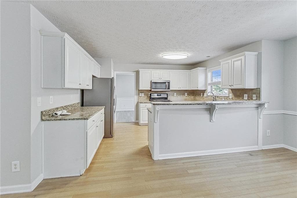 4 bedroom, 3 bathroom, 2,530 sq ft single family residence for rent at 326 Canterbury Place Drive, Suwanee, GA 30024 for $3,000 a month — photo 5