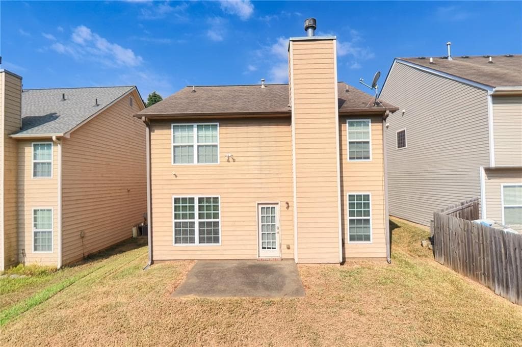 4 bedroom, 3 bathroom, 2,202 sq ft single family residence for sale at 5664 Grande River Road, Atlanta, GA 30349 — photo 2
