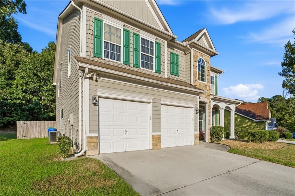 4 bedroom, 3 bathroom, 2,952 sq ft single family residence for sale at 7174 Flagstone Place, Union City, GA 30291 — photo 4