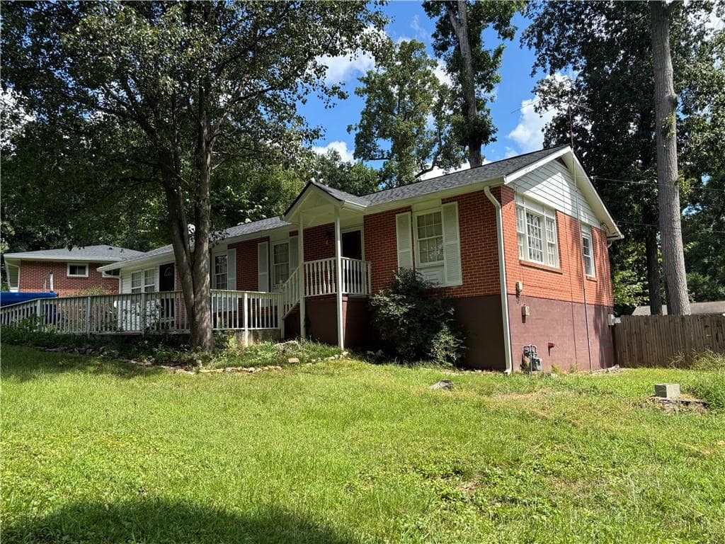 4 bedroom, 2 bathroom, 1,634 sq ft single family residence for sale at 5055 CROWE Drive, Smyrna, GA 30082 — photo 2
