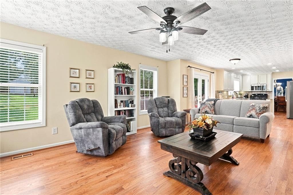 5 bedroom, 4 bathroom, 3,308 sq ft single family residence for sale at 5821 Silverthorn Drive, Flowery Branch, GA 30542 — photo 10