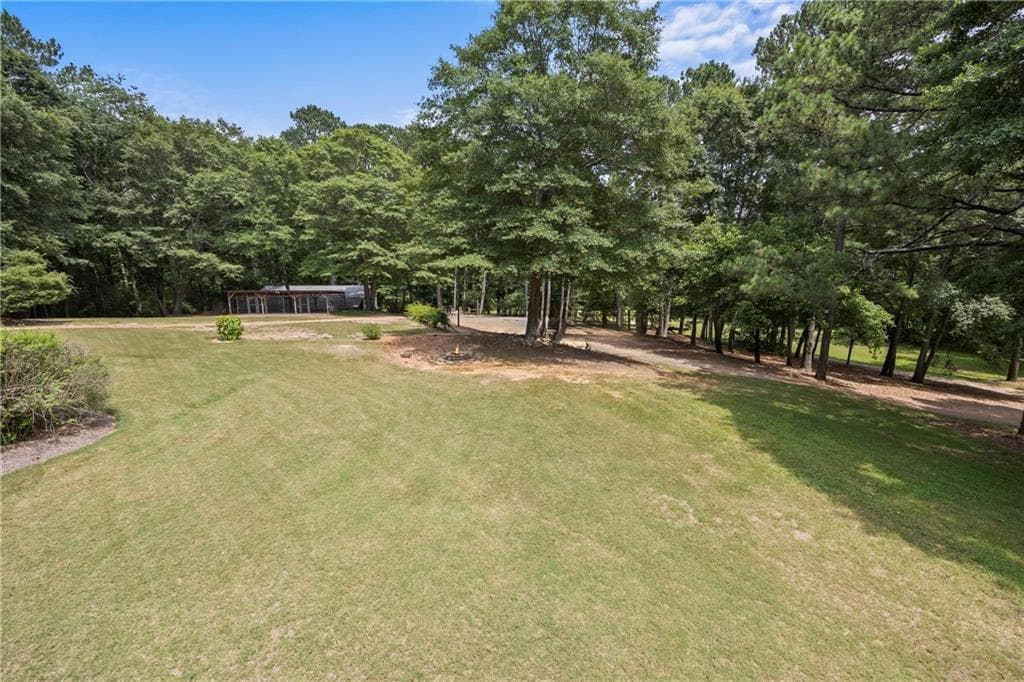 5 bedroom, 4 bathroom, 4,800 sq ft single family residence for sale at 3651 Chandler Haulk Road, Loganville, GA 30052 — photo 10