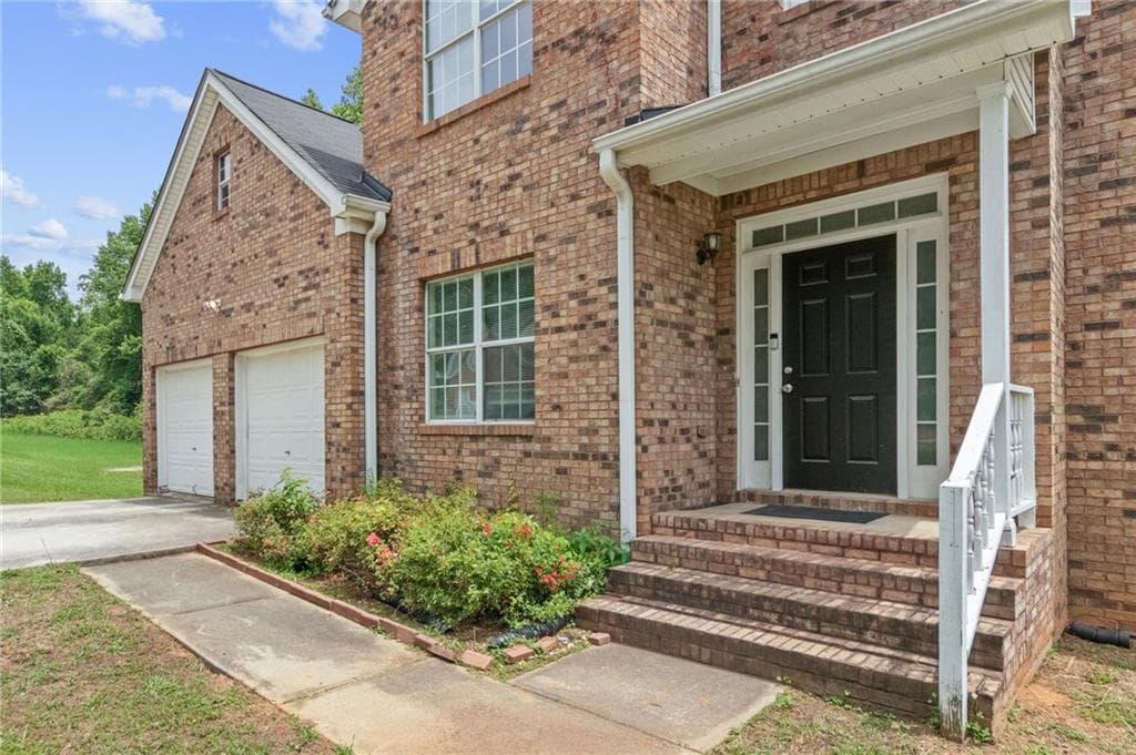5 bedroom, 3 bathroom, 2,420 sq ft single family residence for sale at 272 Wood Sage Drive, Riverdale, GA 30274 — photo 2