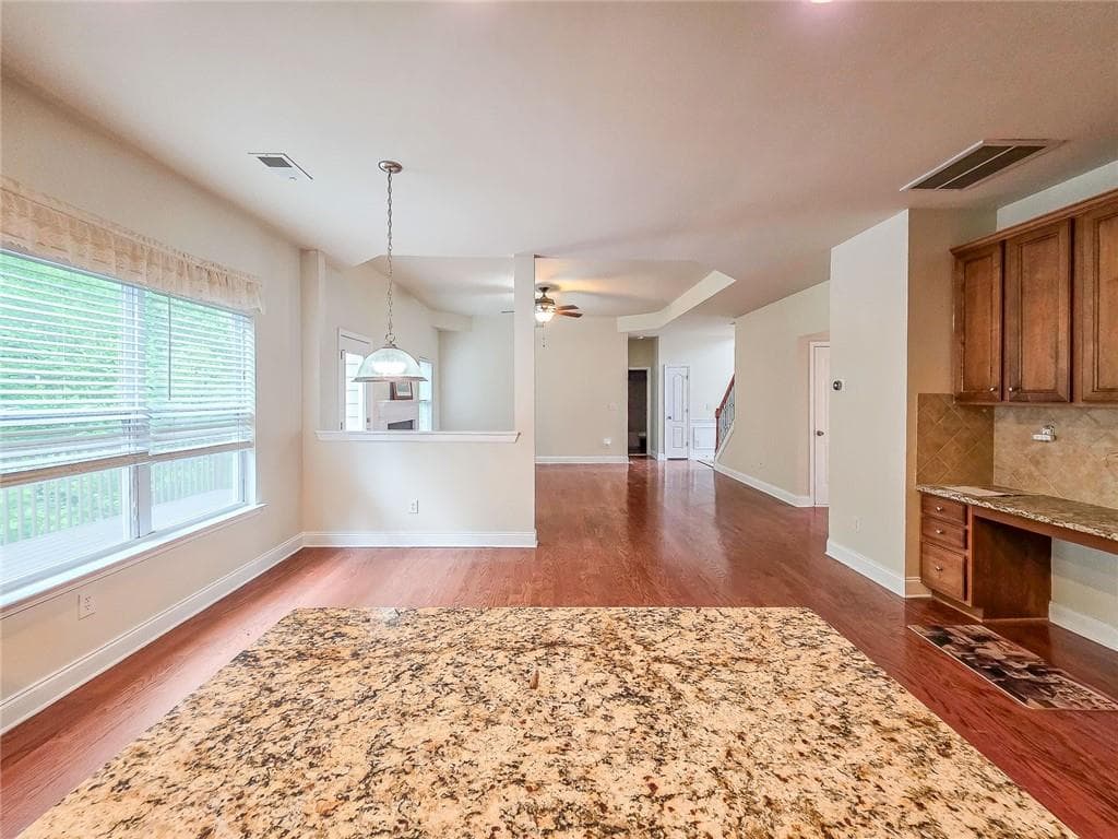 6 bedroom, 4 bathroom, 4,368 sq ft single family residence for sale at 1495 Rocky Shoals Lane, Suwanee, GA 30024 — photo 9