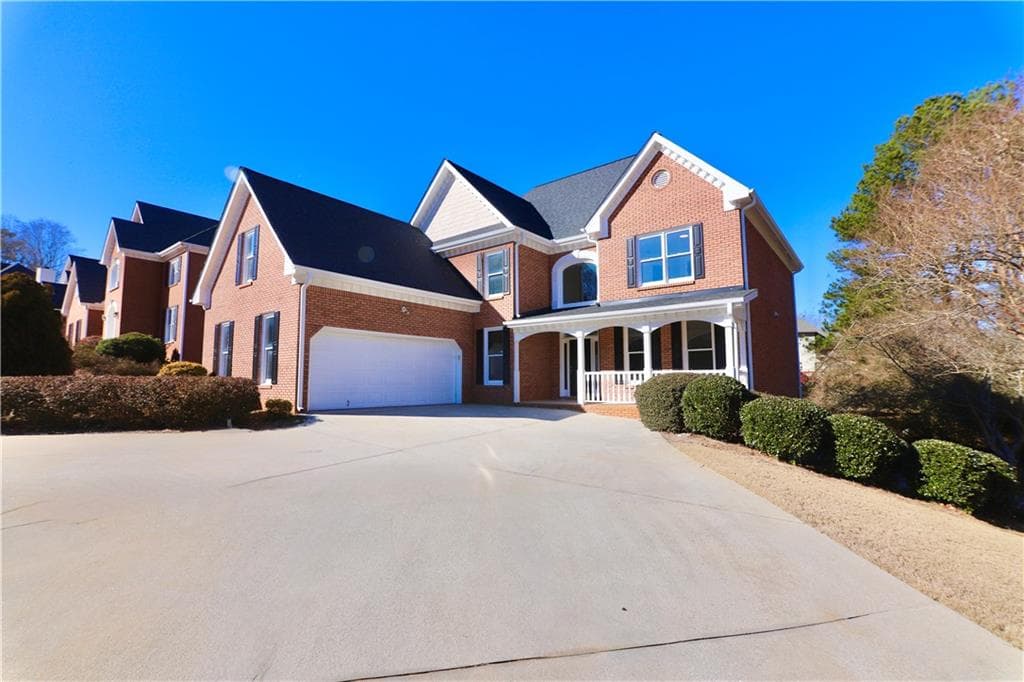 6 bedroom, 5 bathroom, 4,929 sq ft single family residence for sale at 4287 Trotters Way Drive, Snellville, GA 30039 — photo 2