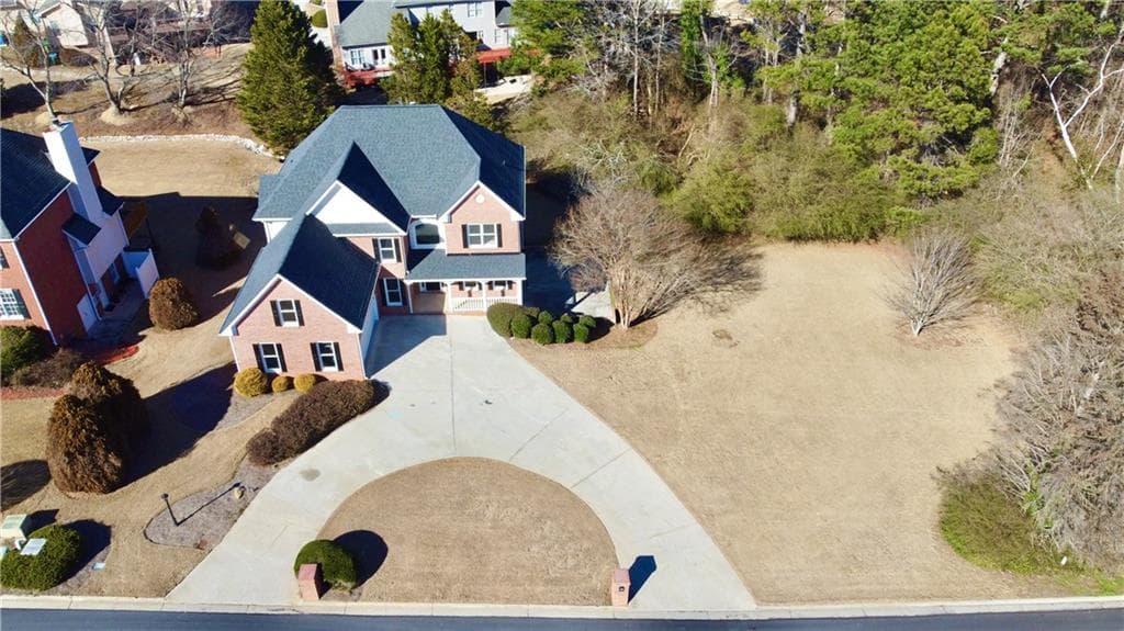 6 bedroom, 5 bathroom, 4,929 sq ft single family residence for sale at 4287 Trotters Way Drive, Snellville, GA 30039 — photo 4