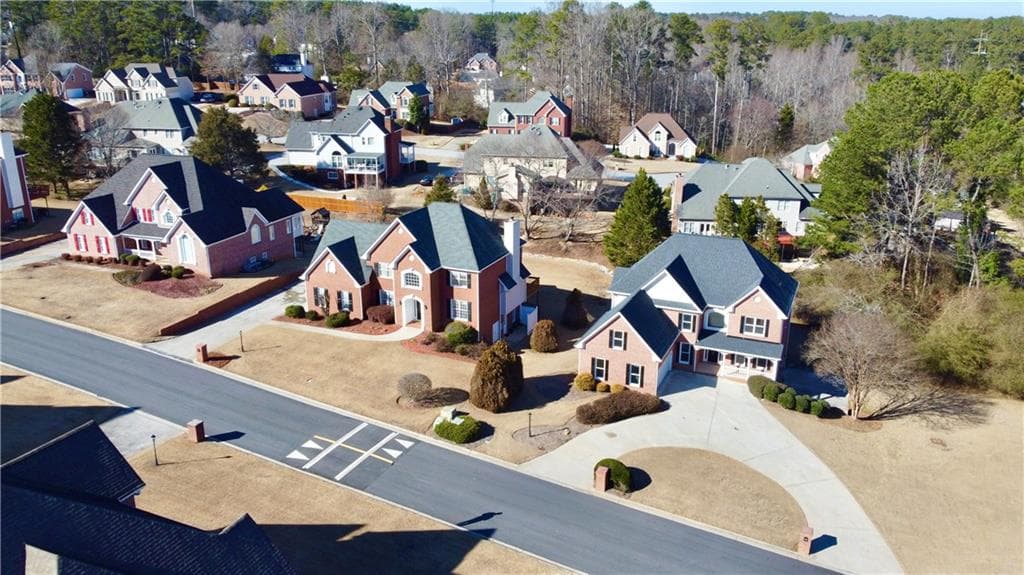 6 bedroom, 5 bathroom, 4,929 sq ft single family residence for sale at 4287 Trotters Way Drive, Snellville, GA 30039 — photo 6