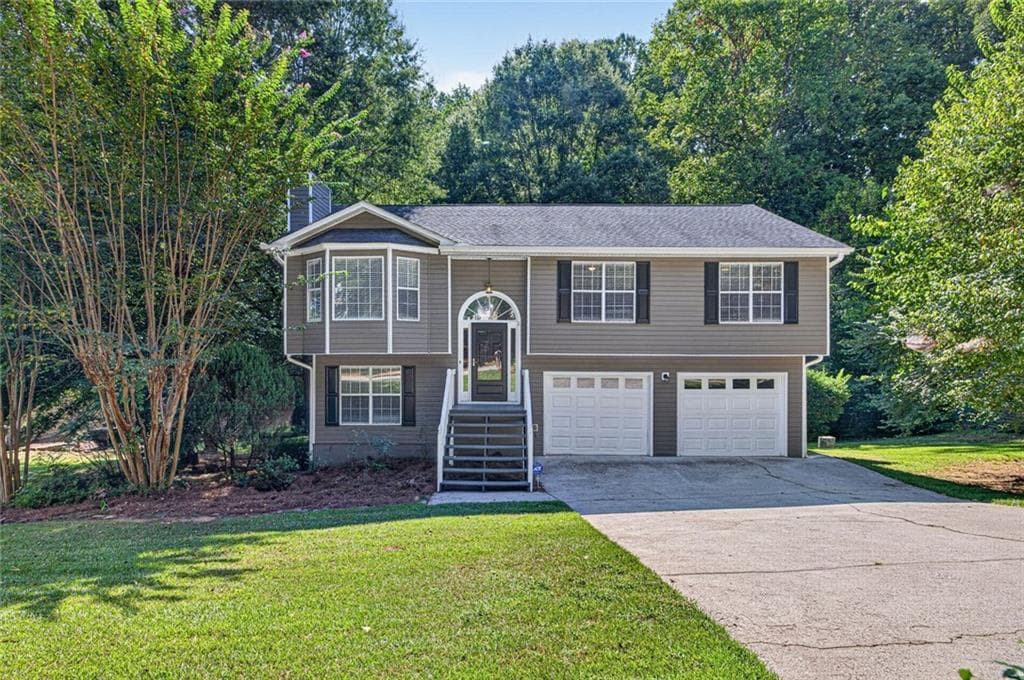 4 bedroom, 3 bathroom, 1,778 sq ft single family residence for sale at 5450 Bushnell Court, Flowery Branch, GA 30542 — photo 1 of 41