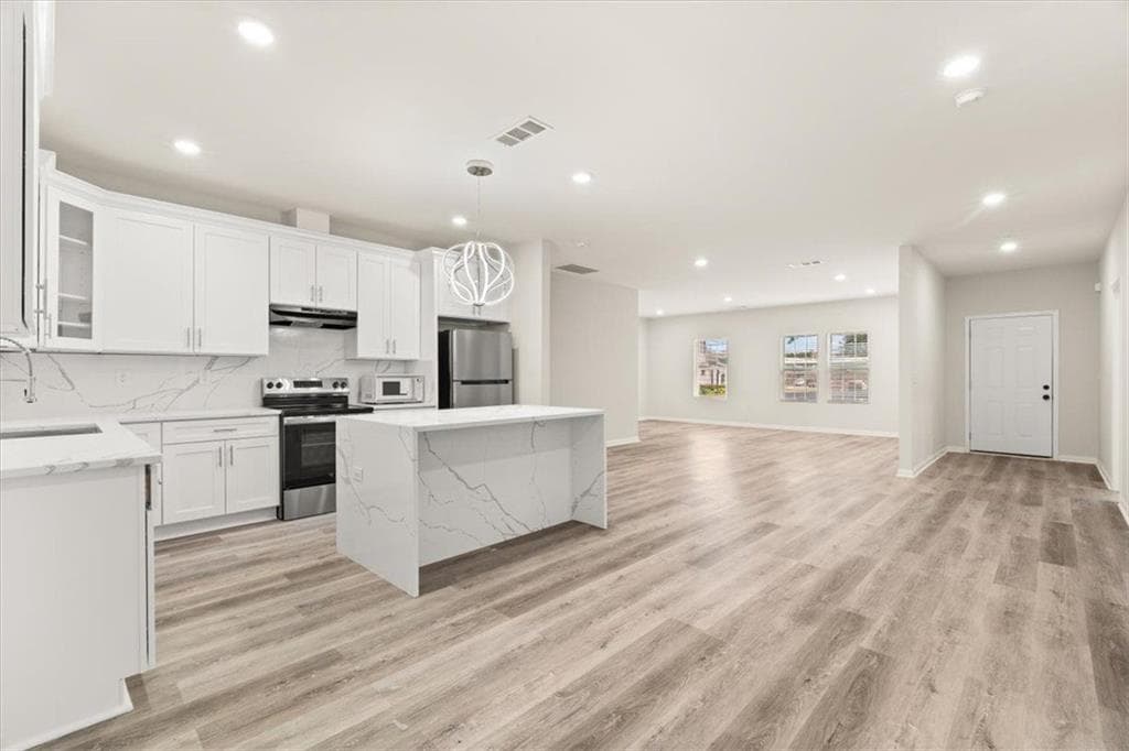 3 bedroom, 4 bathroom, 1,748 sq ft single family residence for sale at 6824 Church Street, Lithonia, GA 30058 — photo 4