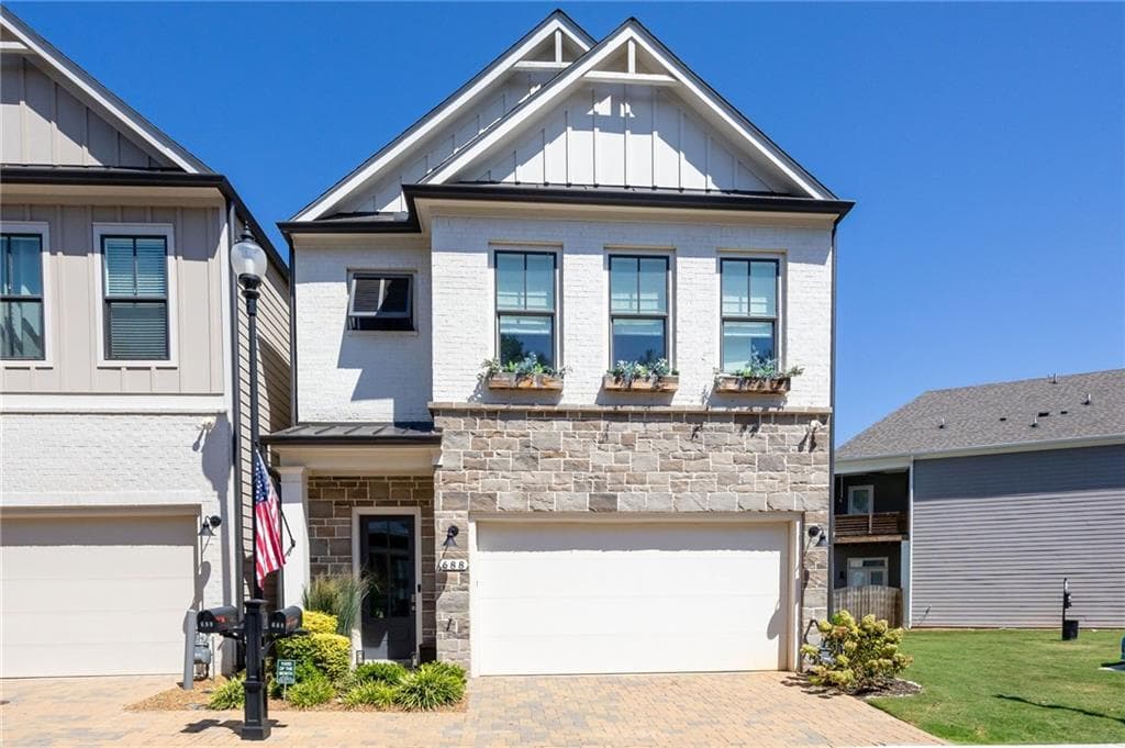 3 bedroom, 4 bathroom, 2,609 sq ft single family residence for sale at 688 Stickley Oak Way, Woodstock, GA 30189 — photo 1 of 40