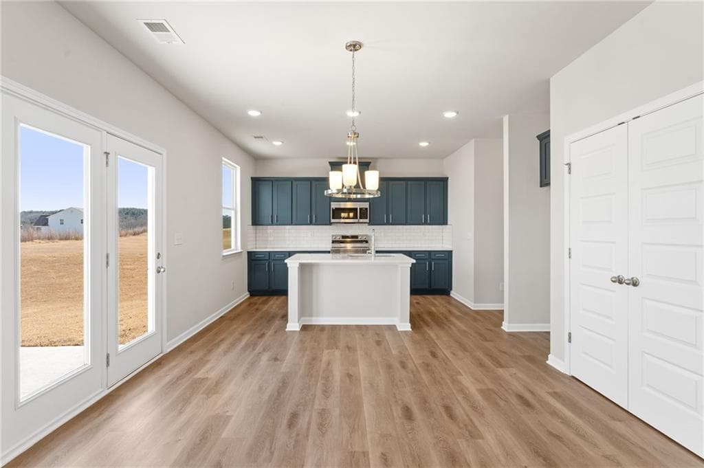 4 bedroom, 3 bathroom, 2,148 sq ft single family residence for sale at 5975 Spring Way, Stonecrest, GA 30038 — photo 5