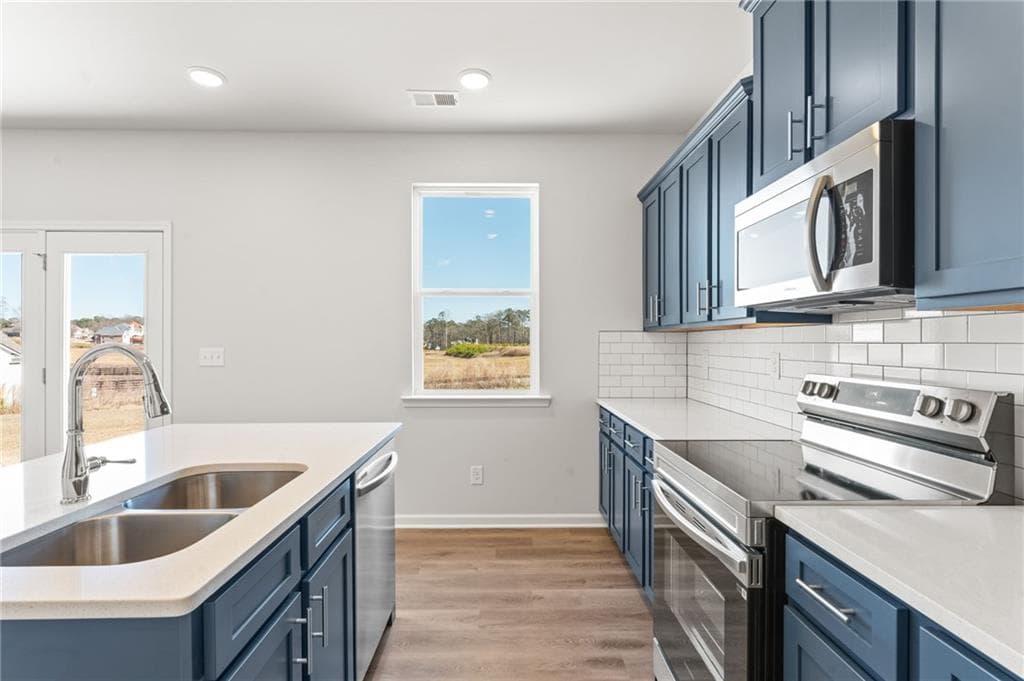 4 bedroom, 3 bathroom, 2,148 sq ft single family residence for sale at 5975 Spring Way, Stonecrest, GA 30038 — photo 7