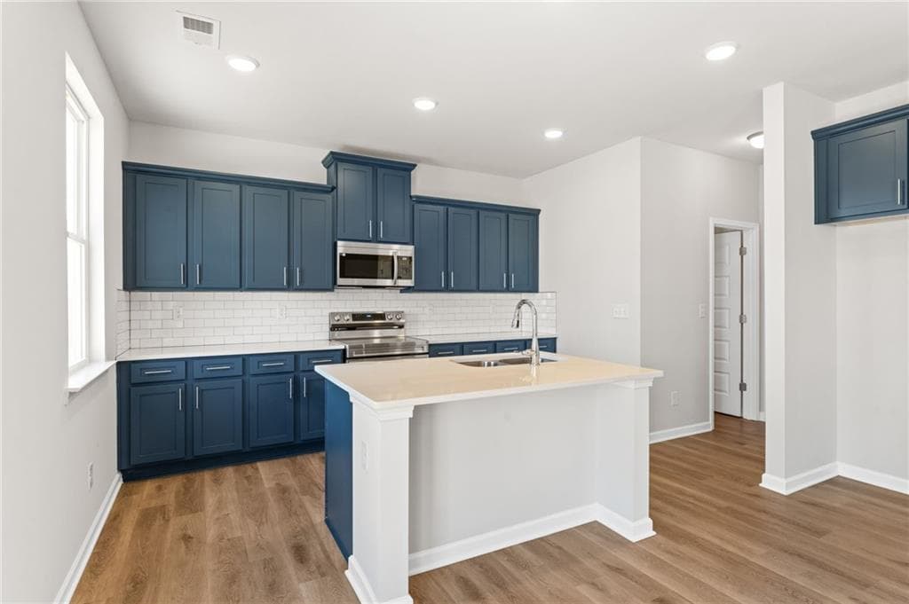 4 bedroom, 3 bathroom, 2,148 sq ft single family residence for sale at 5975 Spring Way, Stonecrest, GA 30038 — photo 8
