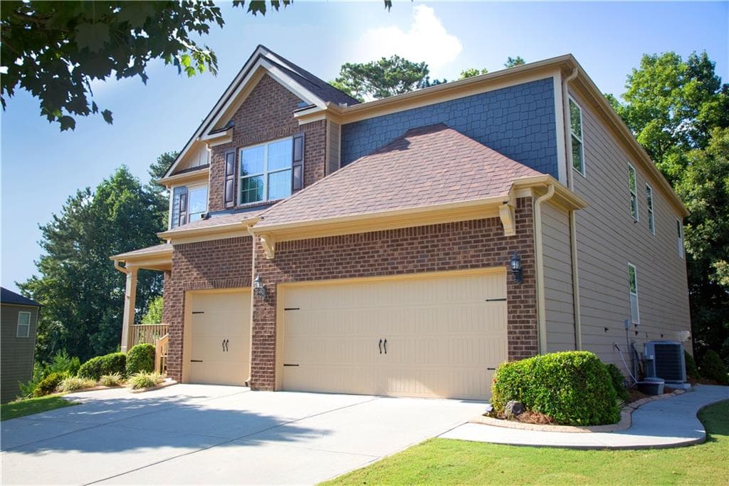 6 bedroom, 5 bathroom, 5,840 sq ft single family residence for sale at 2410 Cain Circle, Dacula, GA 30019 — photo 4