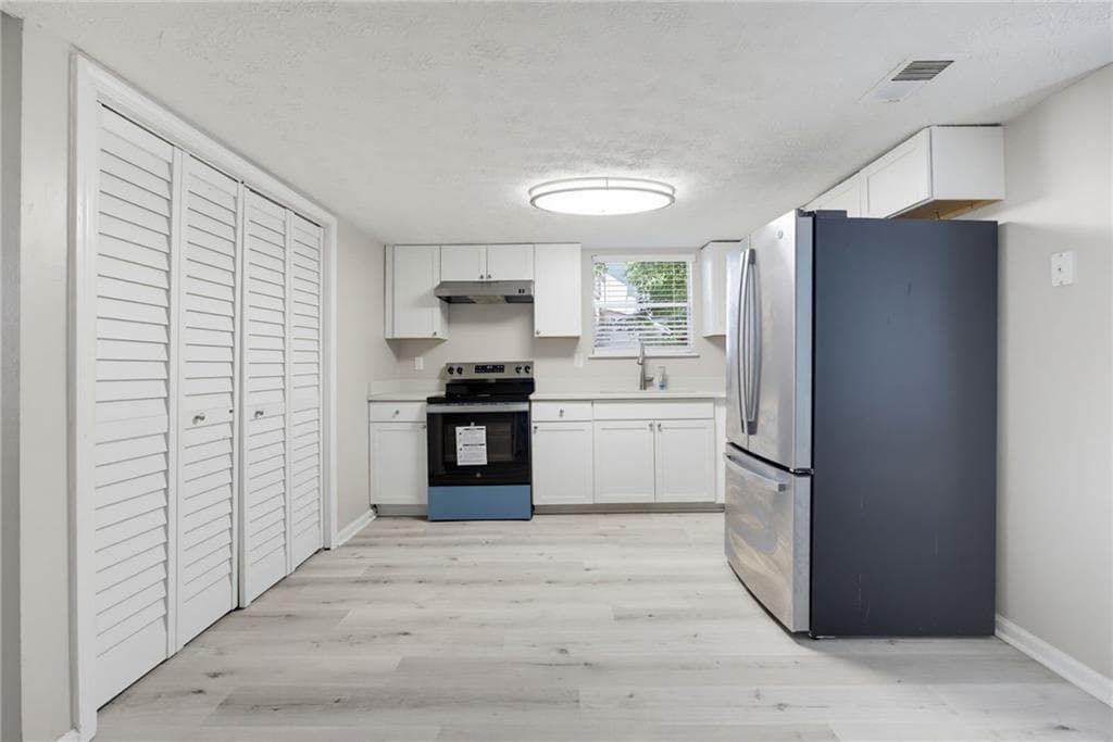 3 bedroom, 2 bathroom, 1,574 sq ft single family residence under contract at 5570 Downs Way, Lithonia, GA 30058 — photo 9