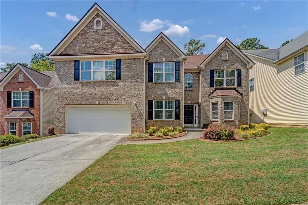 5 bedroom, 4 bathroom, 3,417 sq ft single family residence for sale at 4633 Beau Point Court, Snellville, GA 30039 — photo 1 of 46